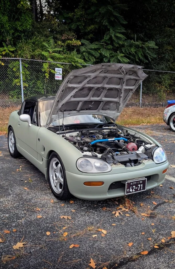 Suzuki Cappuccino - Passenger's side, front 3/4