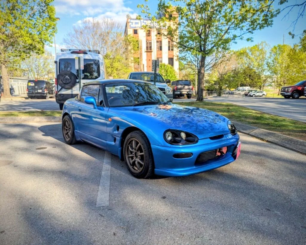 Suzuki Cappuccino - Passenger’s side, front 3/4