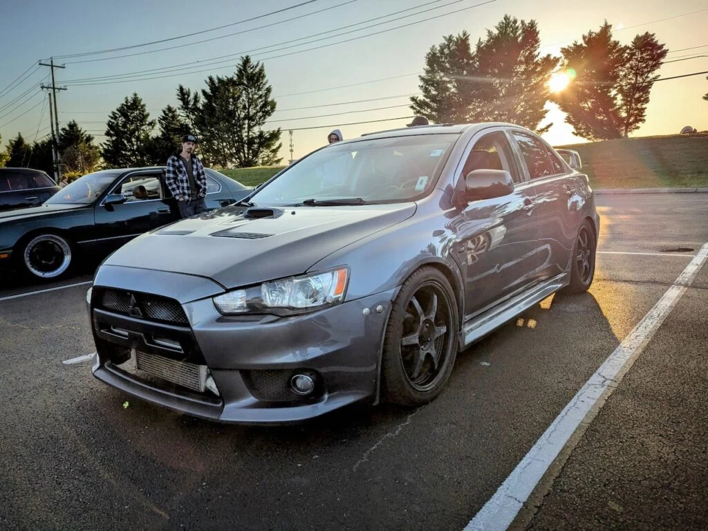 Mitsubishi Lancer Evolution X - Driver's side, front 3/4