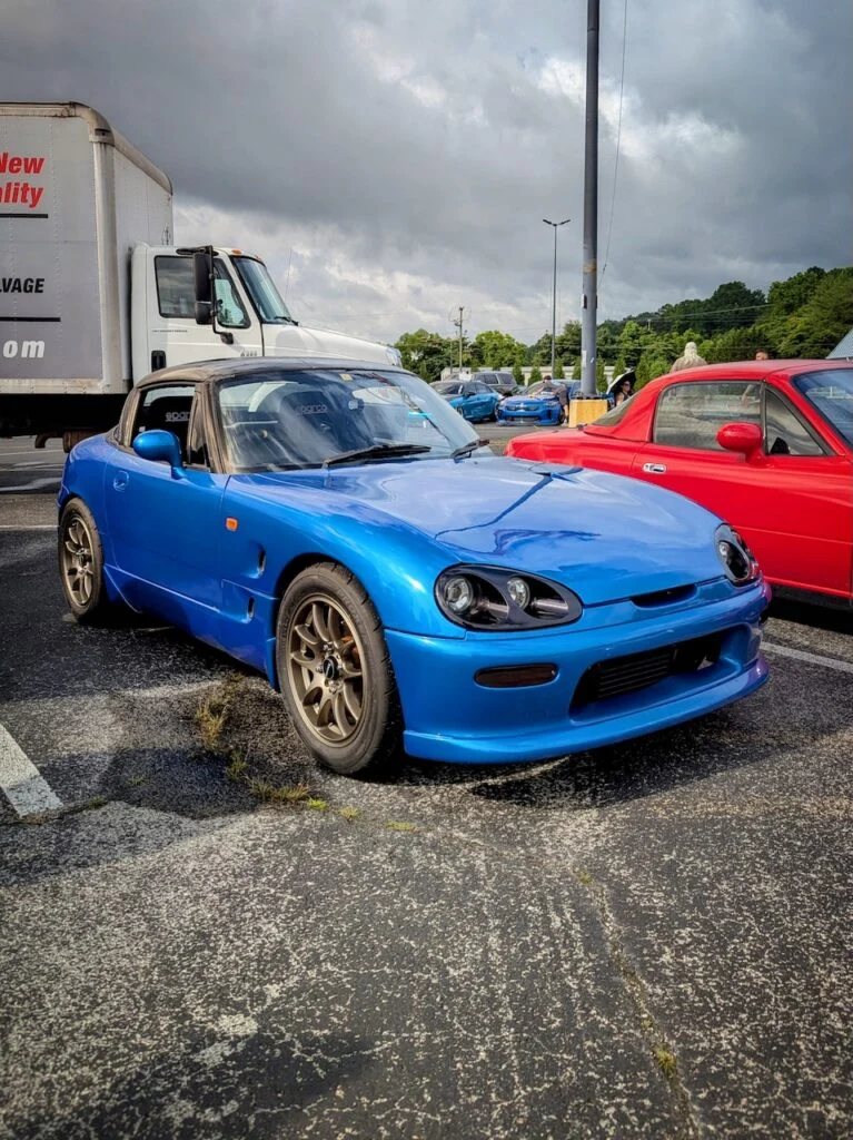 Suzuki Cappuccino - Passenger's side, front 3/4