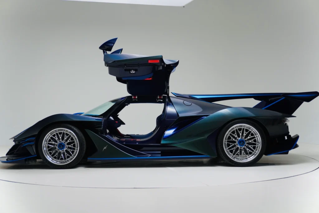 Blue and green Apollo IE with gullwing doors open, showing side profile in a studio setting